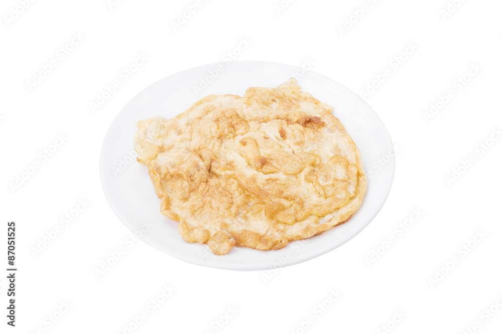 Omelette, typical rolled plain omelette isolated on a white back
