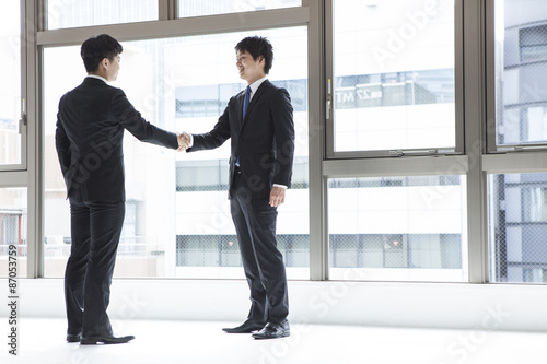 Young businessman have a handshake
