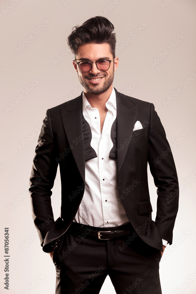 Fototapeta premium Happy elegant business man smiling at the camera