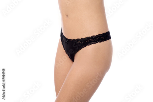 Young woman in black panties