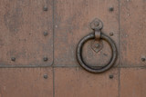 Old rusty door with door-handl