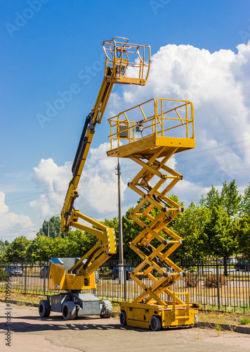 Scissor lift and articulated boom lift photo