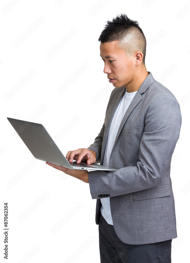 Asian businessman use of laptop computer Asian businessman use of laptop computer
