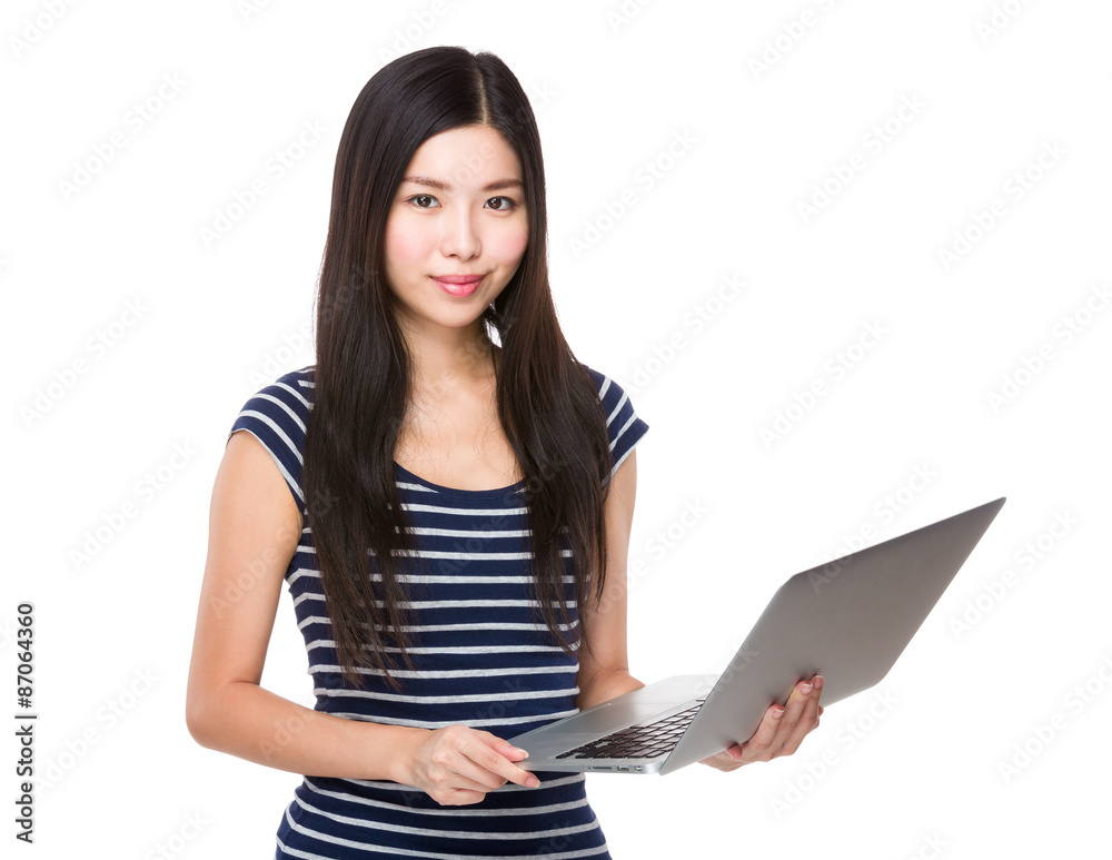 Asian woman use of the laptop computer Asian woman use of the laptop computer