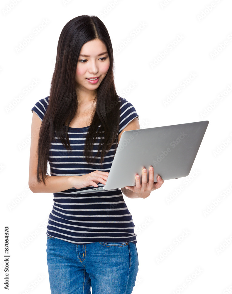 Woman use of the notebook computer Woman use of the notebook computer