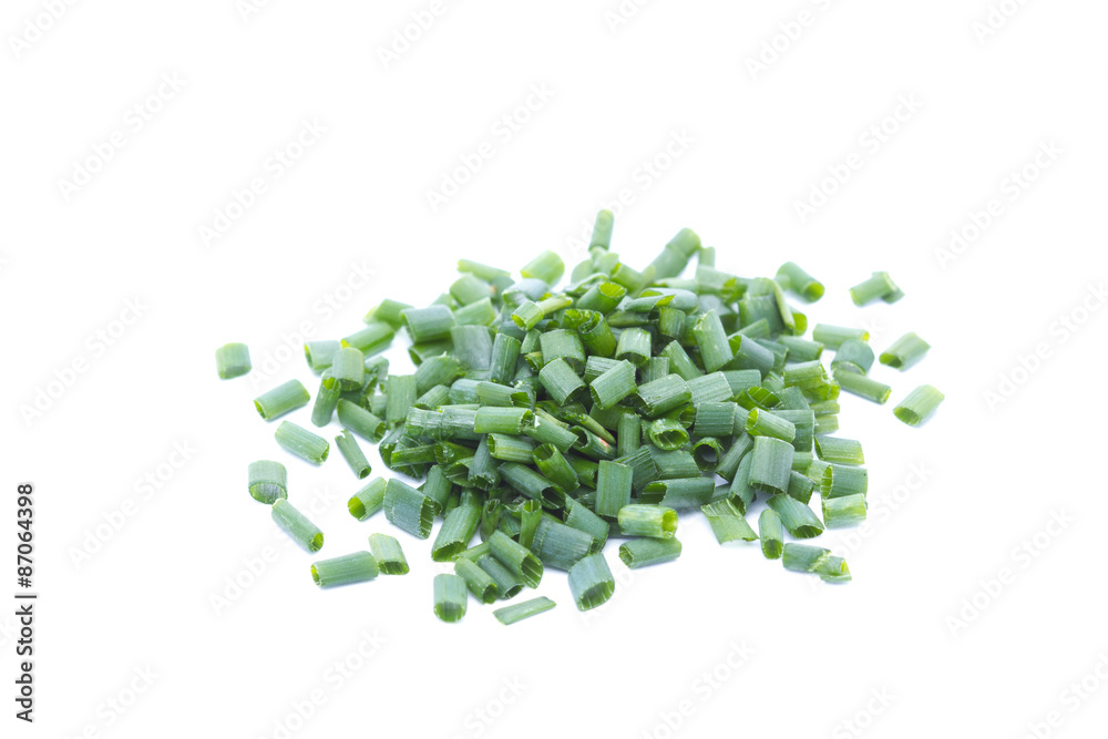 Fresh chives chopped into pieces isolated on white background Fresh chives chopped into pieces isolated on white background