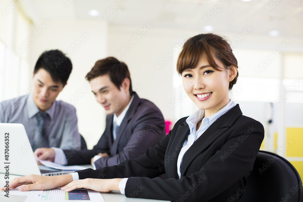 Young business woman working in the office