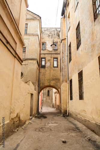 Vintage old street in Lviv, walls with windows © projectio