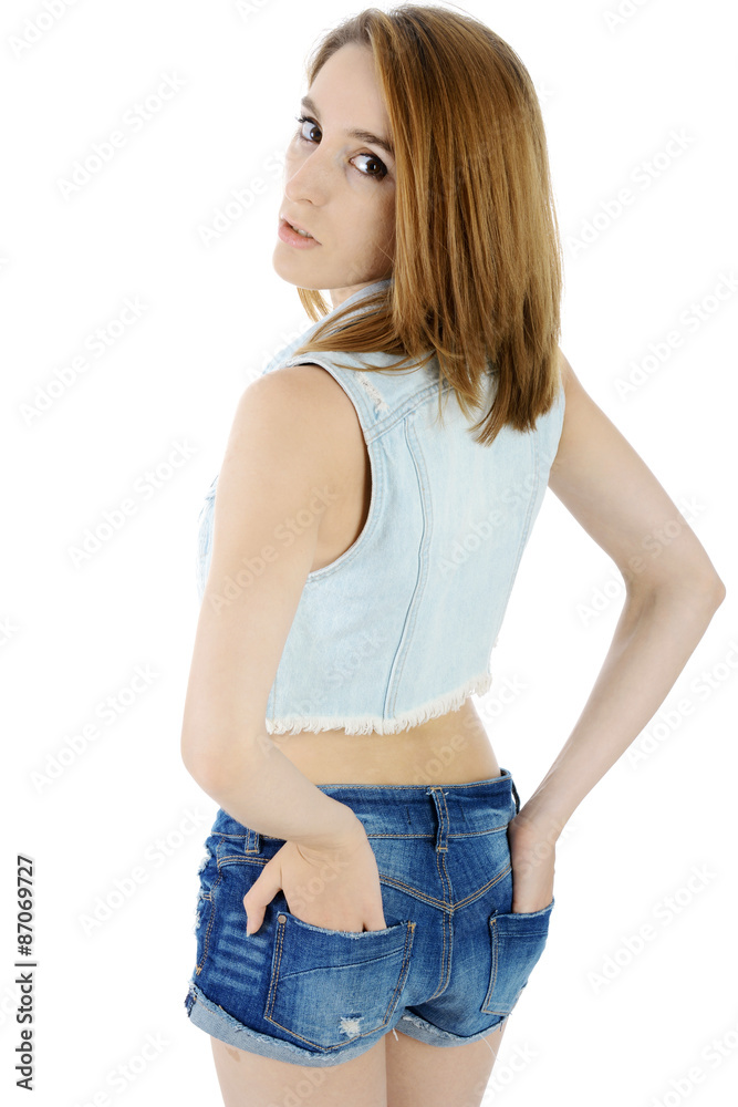 Mädchen in Hotpants trägt Weste aus Jeans Stock Photo | Adobe Stock