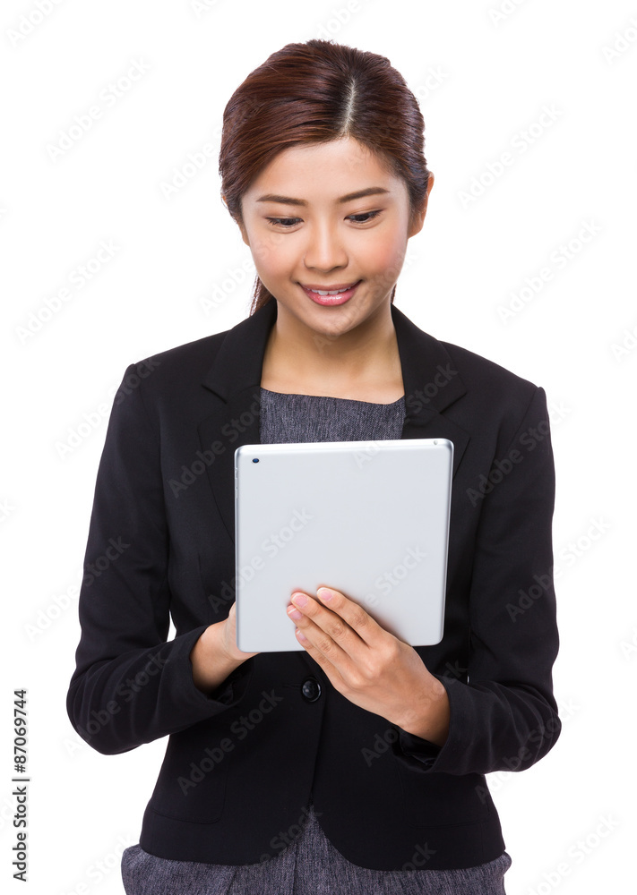 Young Businesswoman use of the tablet pc Young Businesswoman use of the tablet pc