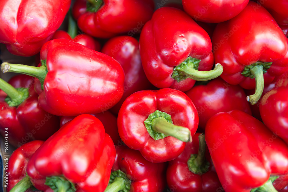 Fresh red sweet bell peppers on the market.