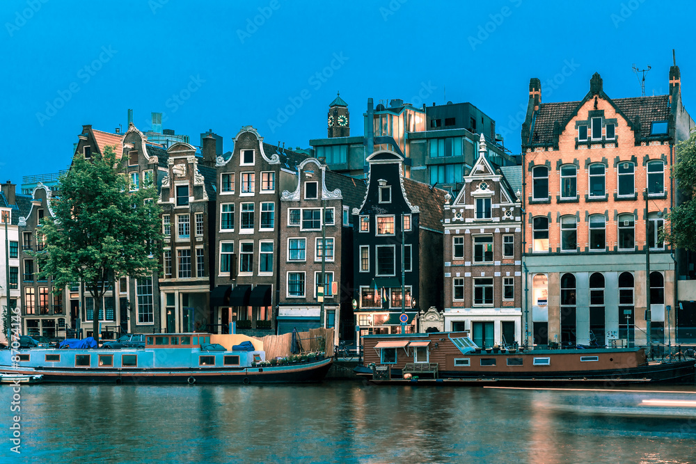 Fototapeta premium Night Amsterdam canal with dutch houses