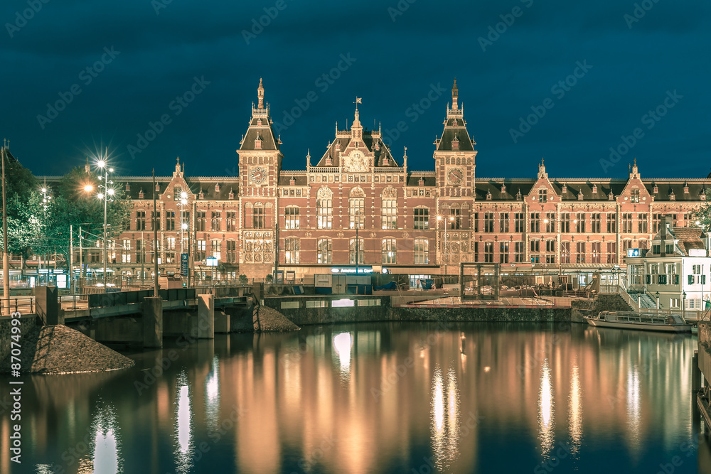 Night Amsterdam canal and Centraal Station