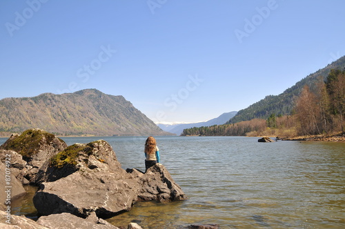 peaceful meditation on lake Teletskoe, in Altay Russia 