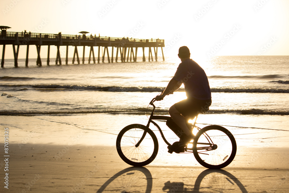 Fototapeta premium Bike Riding on the beach