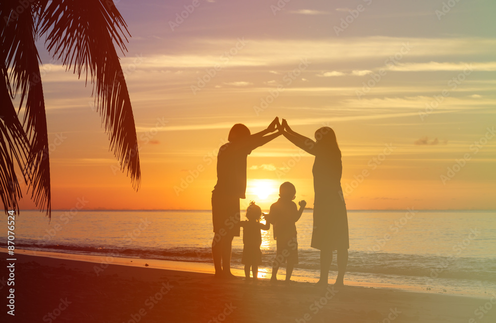 Fototapeta premium Happy parents making home for kids at sunset