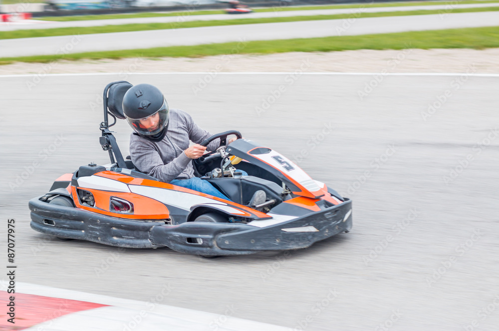 Man driving a Kart Man driving a Kart