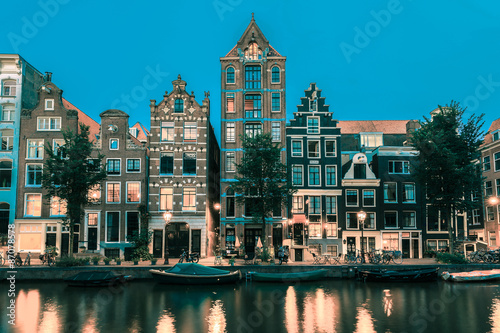 Night Amsterdam canal with dutch houses