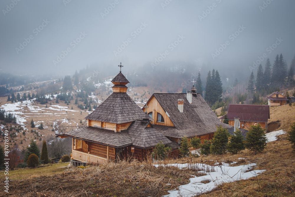 Monastery and fog in the mountains
