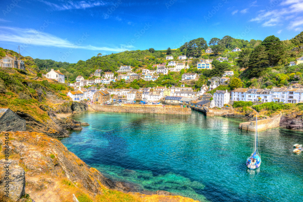 Polperro harbour Cornwall England clear blue and turquoise sea HDR 