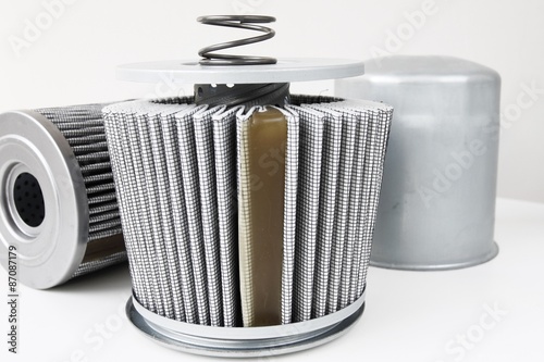 Fuel filter for engine car indetail isolate on white photo