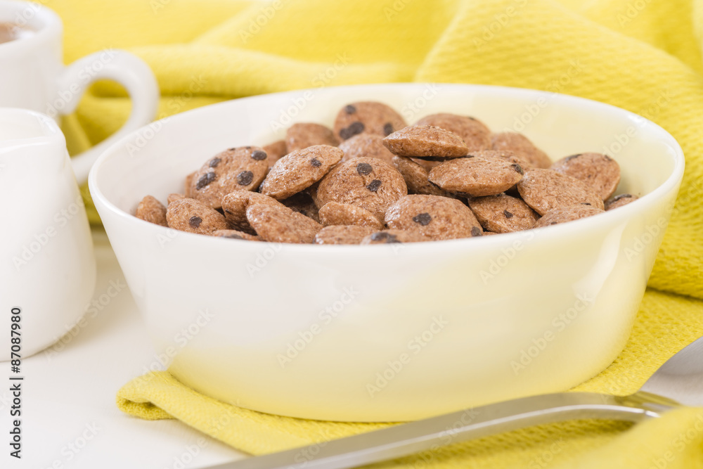 Cookie Crisp - Chocolate chips cookies cereals in yellow bowl.
Cookie Crisp - Chocolate chips cookies cereals in yellow bowl.