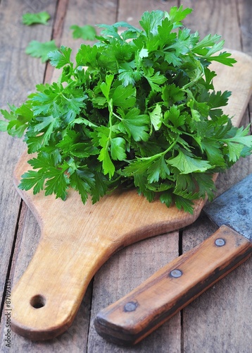 organic parsley on a wooden table. rustic style