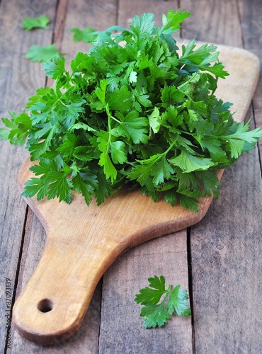 organic parsley on a wooden table. rustic style