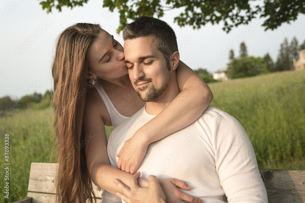 Young couple in love outdoor at the sunset Young couple in love outdoor at the sunset
