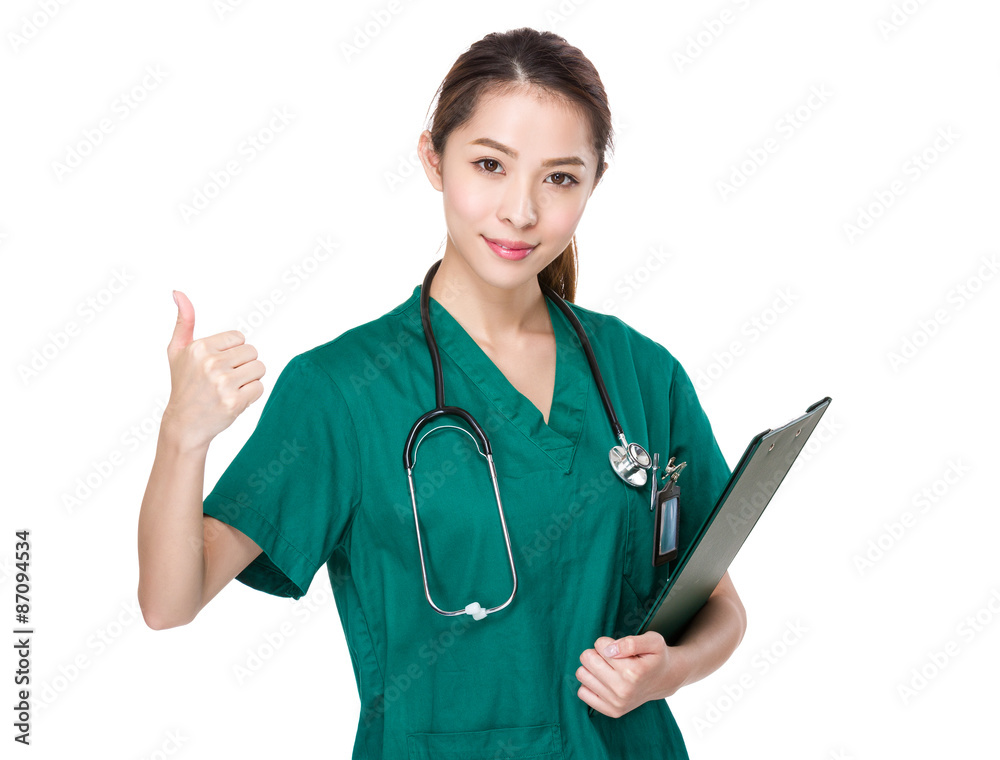 Doctor woman with clipboard and thumb up Doctor woman with clipboard and thumb up