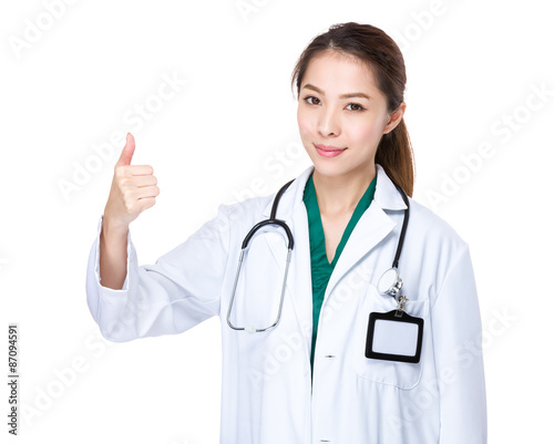 Asian doctor with thumb up