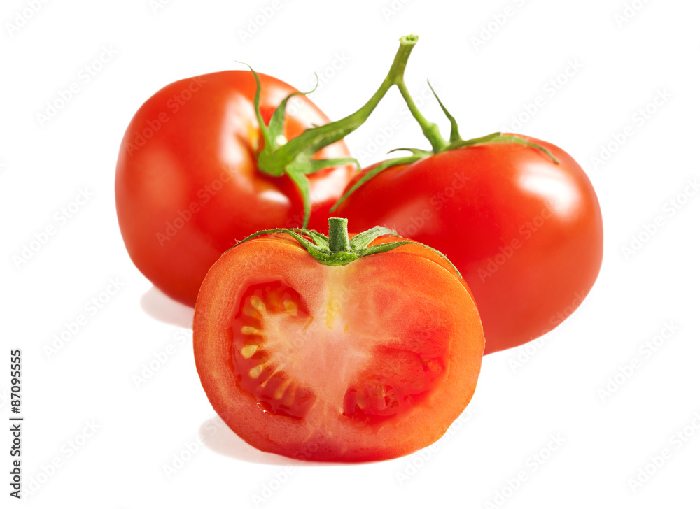 Fresh Tomatoes. Whole and a half isolated on white background Fresh Tomatoes. Whole and a half isolated on white background
