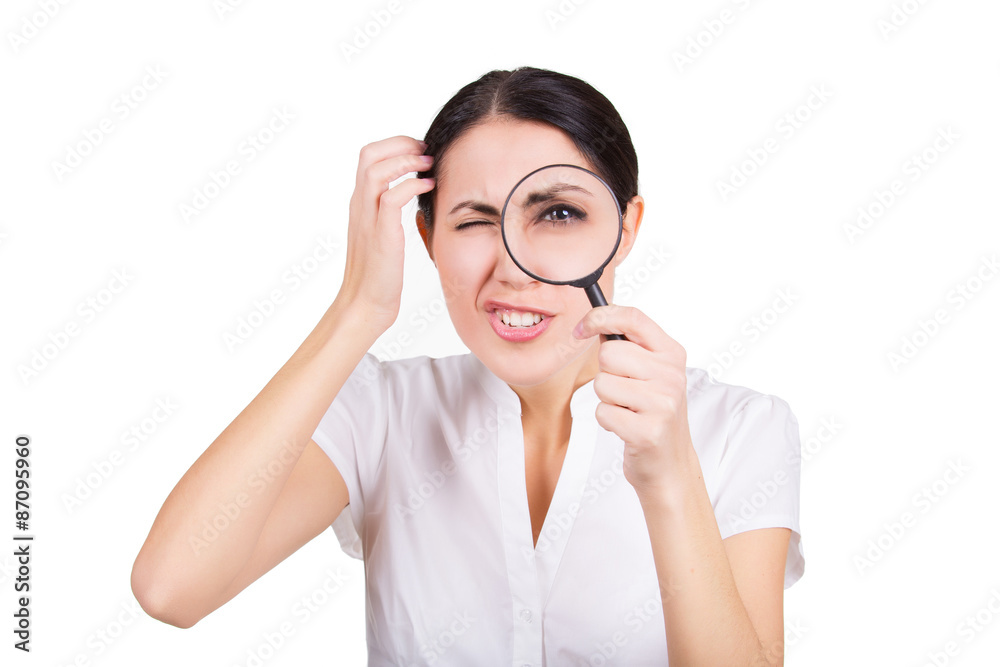 Beautiful funny girl searching with magnifier. Isolated Beautiful funny girl searching with magnifier. Isolated
