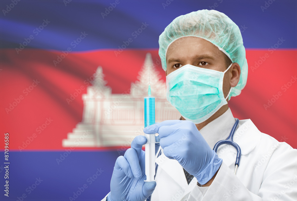 Doctor with syringe in hands and flag on background series - Cambodia Doctor with syringe in hands and flag on background series - Cambodia