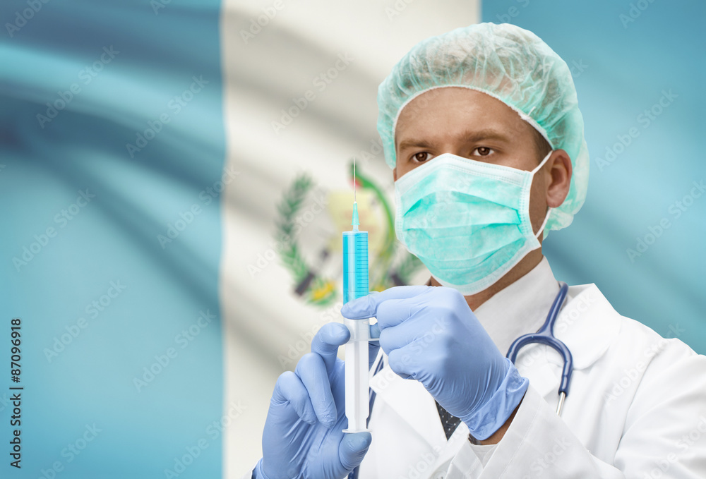 Doctor with syringe in hands and flag on background series - Guatemala Doctor with syringe in hands and flag on background series - Guatemala