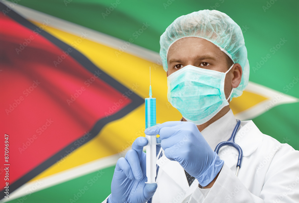 Doctor with syringe in hands and flag on background series - Guyana Doctor with syringe in hands and flag on background series - Guyana