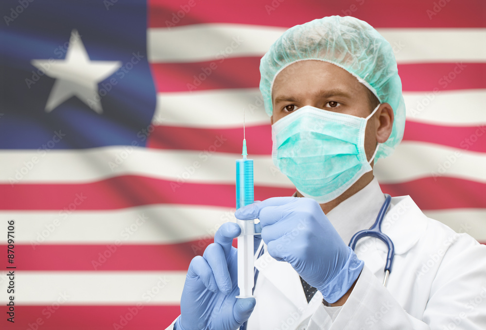 Doctor with syringe in hands and flag on background series - Liberia Doctor with syringe in hands and flag on background series - Liberia