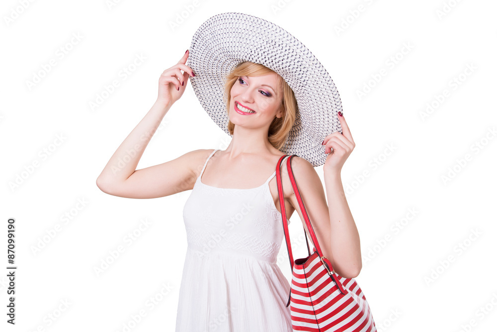 Pretty girl in elegant hat holding red white stripped bag Pretty girl in elegant hat holding red white stripped bag