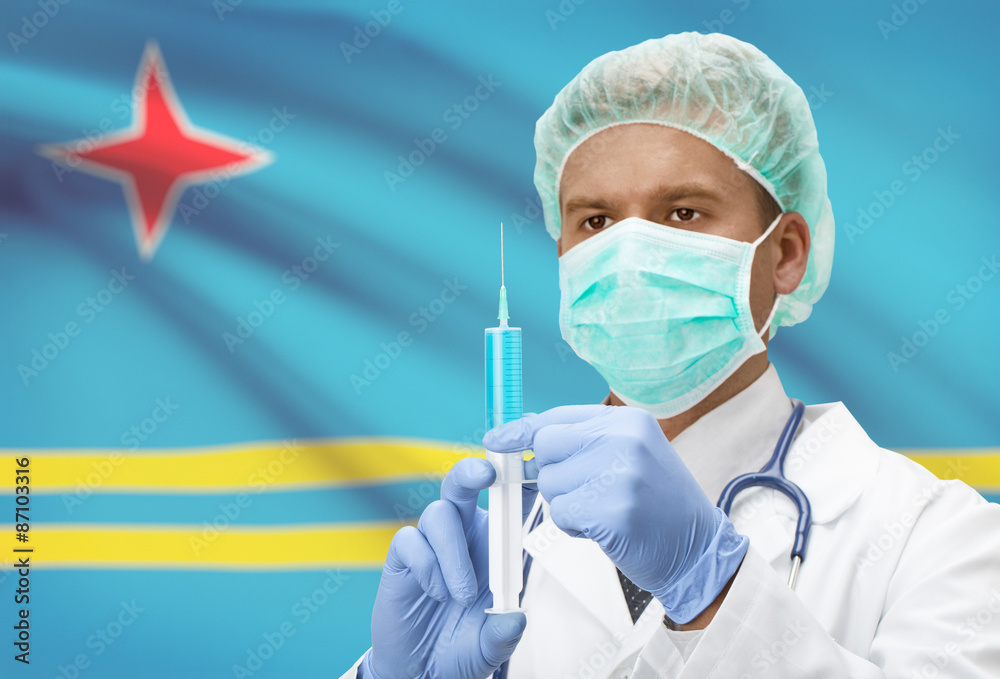 Doctor with syringe in hands and flag on background series - Aruba Doctor with syringe in hands and flag on background series - Aruba