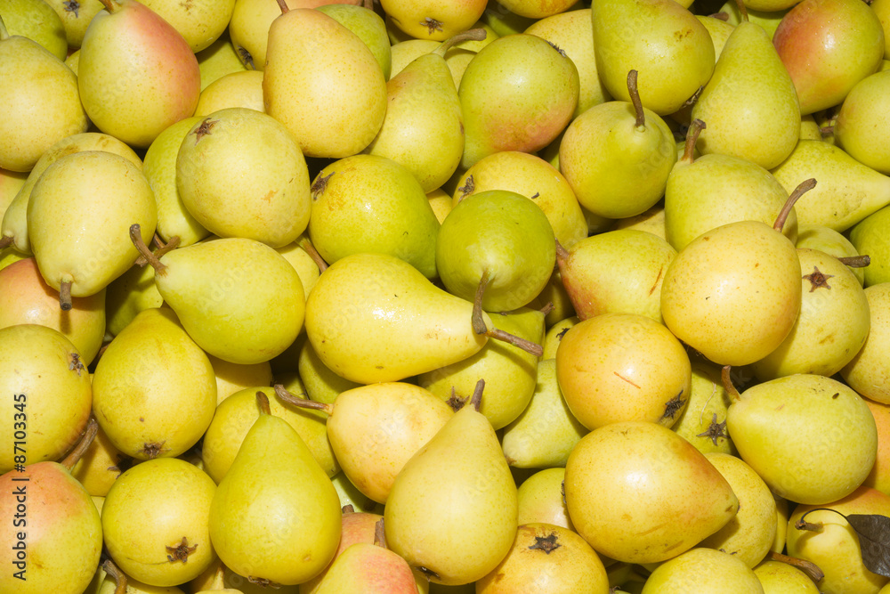 Juicy ripe pears at local fruit market bazaar
