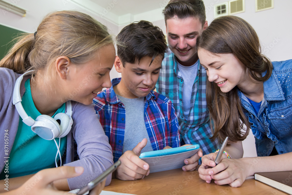 group of students studying with tablet