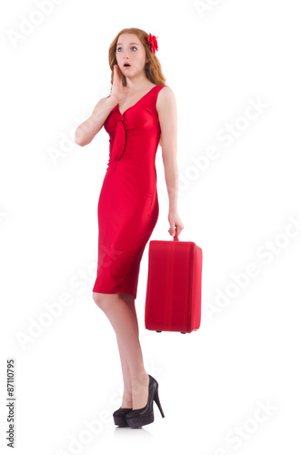 Pretty young girl in red dress holding trunk isolated on white © Elnur