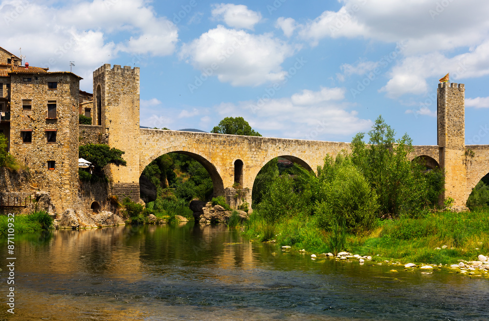   Romanesque bridge over Fluvia river in Besalu. Catalonia
