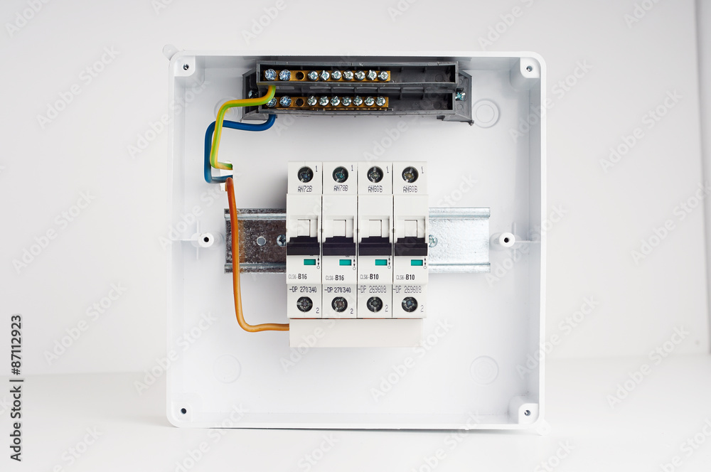 Electrical cabinet with four automatic fuses with wires. Ready for installing. Electricity distribution box. Fusebox. Electrical cabinet with four automatic fuses with wires. Ready for installing. Electricity distribution box. Fusebox.