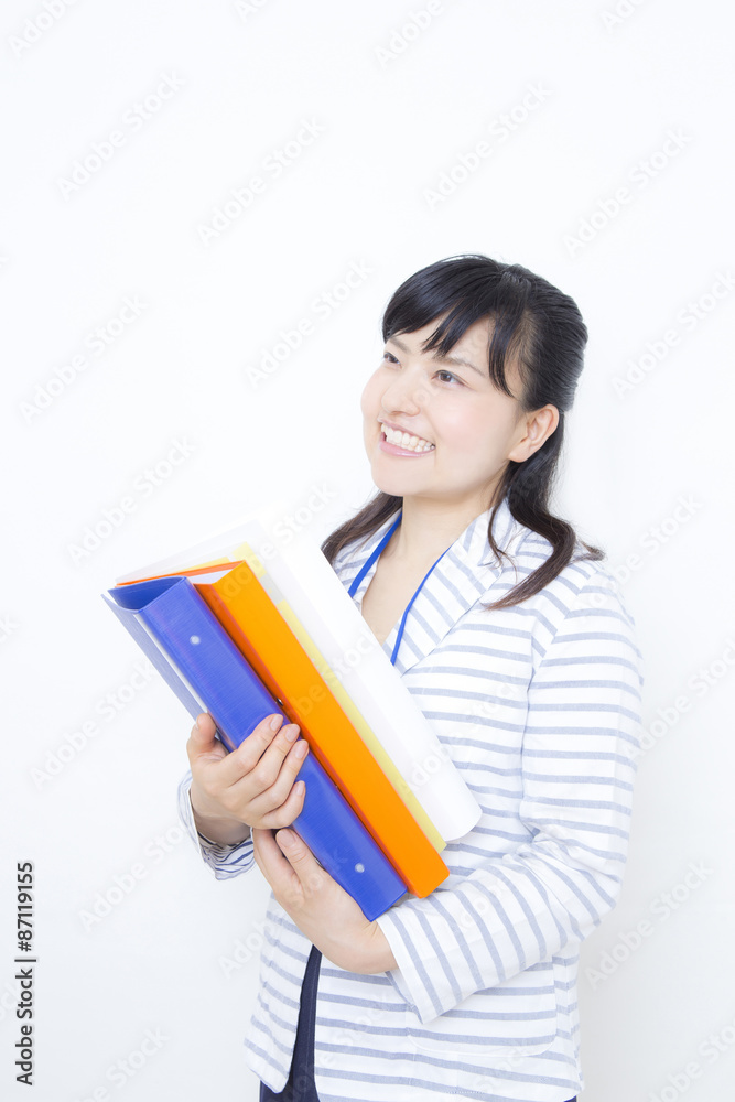 ファイルを沢山持つ女性 ファイルを沢山持つ女性
