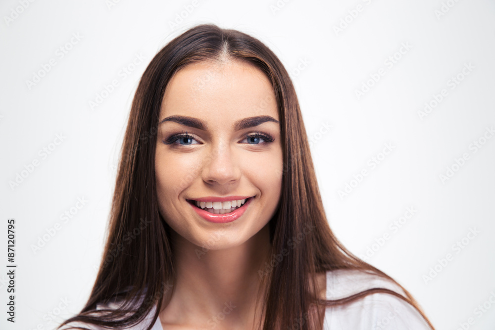 Smiling young girl looking at camera