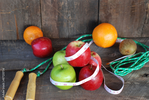 Green apple, Red apple. Fruit Diet concept on a wooden floor.
