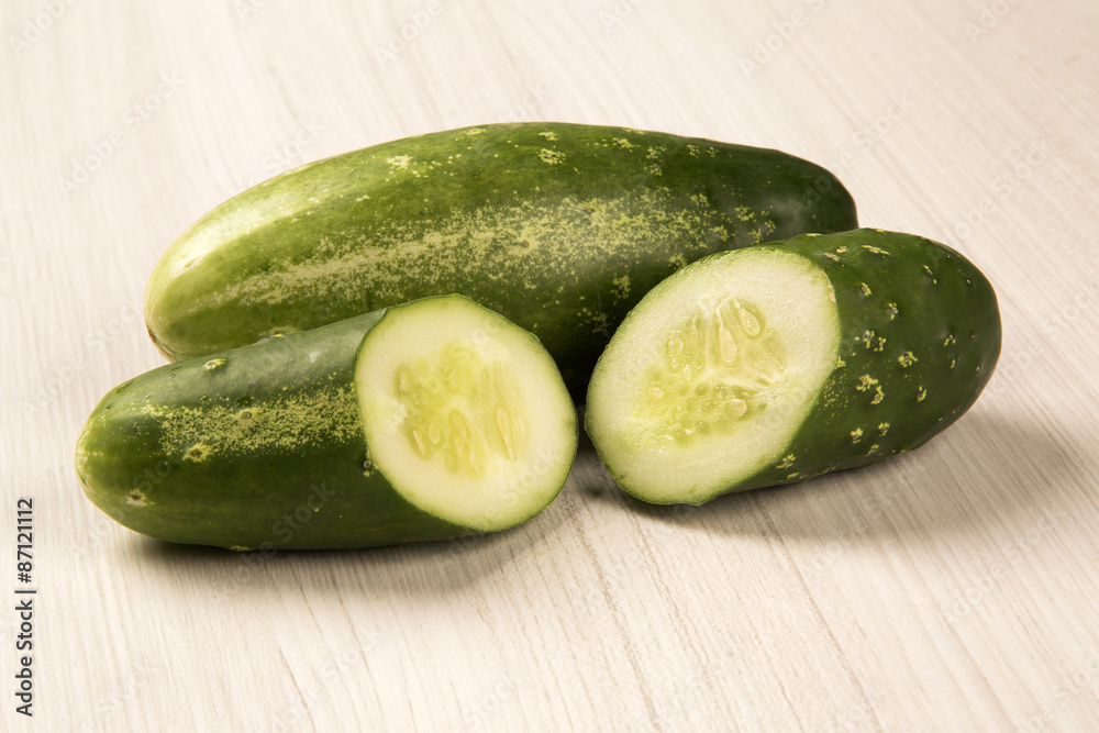 Fresh cucumber on the wooden table Fresh cucumber on the wooden table
