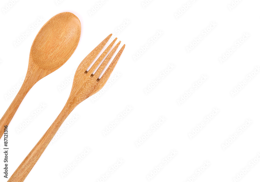 Wooden Spoon and Fork on white blockground Wooden Spoon and Fork on white blockground