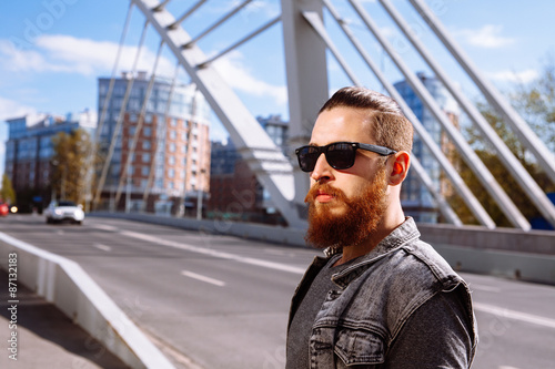 Bearded hipster sunglasses in the city © Nigrechok